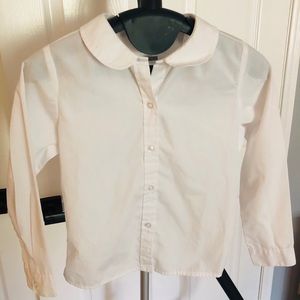 White collared shirt.